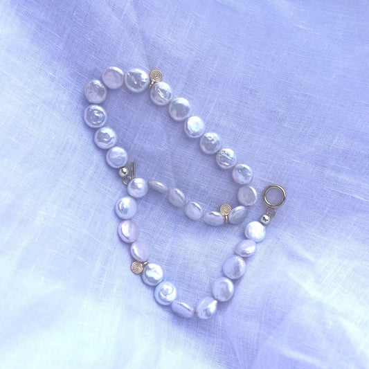 Spiral pearl necklace